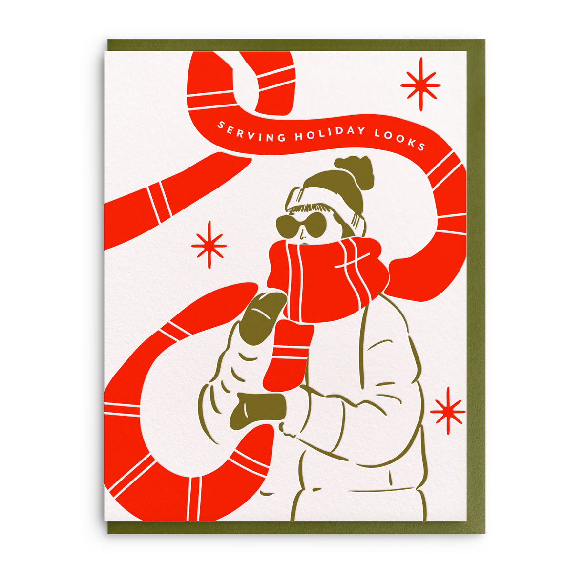 Illustration of a woman in a pink scarf and sunglasses holding a coffee and a stack of wrapped gifts, framed in blue with a pink ribbon swirl, on a white card.