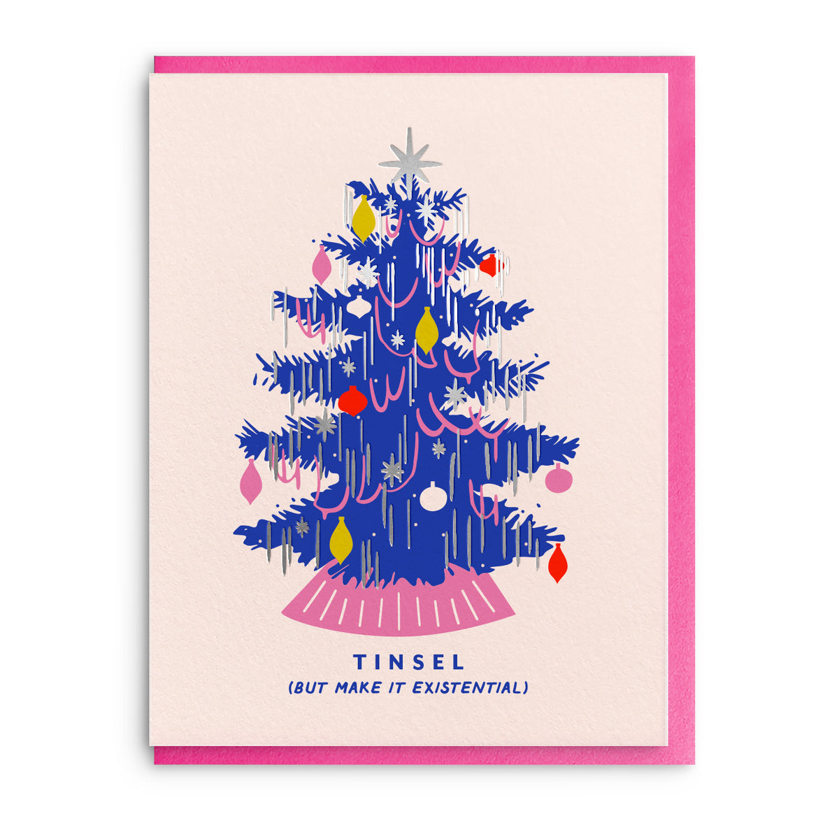 Illustration of a Christmas tree trimmed with ornaments and tinsel in blue, pink, and gold foil, with the word Tinsel below, on a pale pink card with a pink envelope.